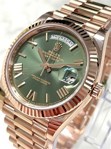 Rolex rose gold day date 40